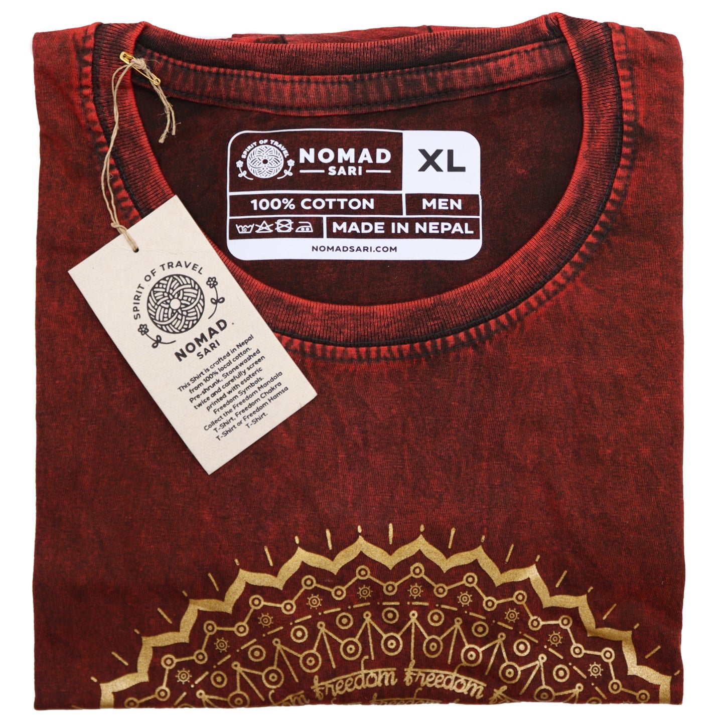 Folded maroon shirt with gold embroidery and a visible tag on a white background