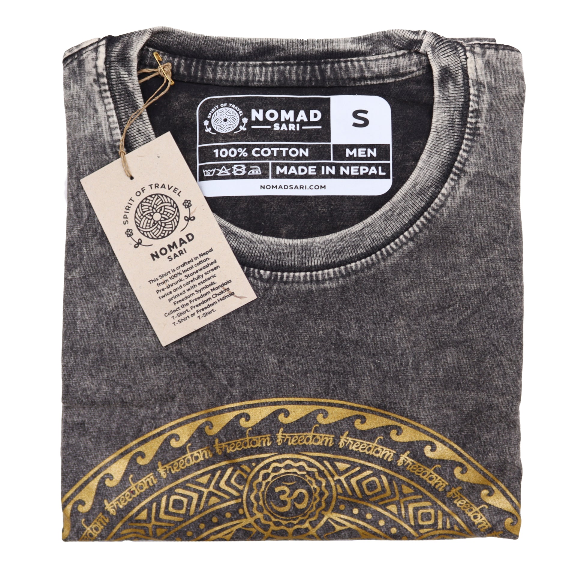 Folded gray t-shirt with gold design and 'Nomad Sari' label on a white background