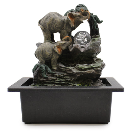 Tabletop Water Feature - 30cm - Elephant Family sculptures on a white background