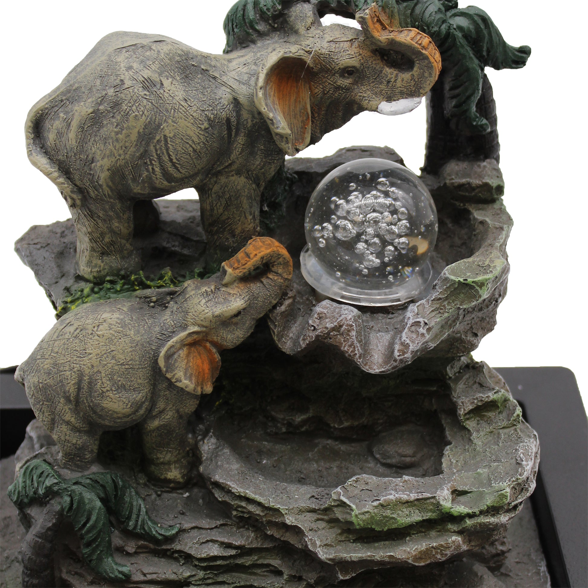 close up view Tabletop Water Feature - 30cm - Elephant Family around a crystal ball on a rocky base.